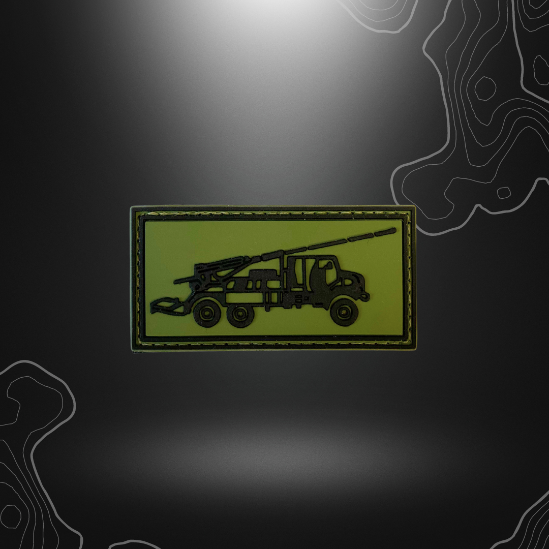 Patch brodé du spécialiste Caesar sur fond vert varié