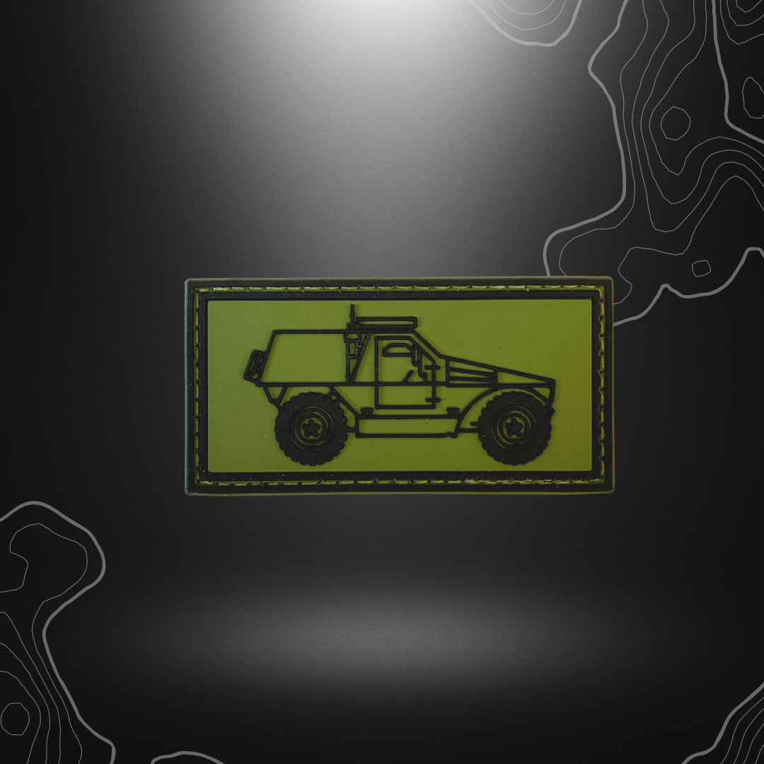 Patch de spécialiste VBL sur fond vert variant légèrement de teinte