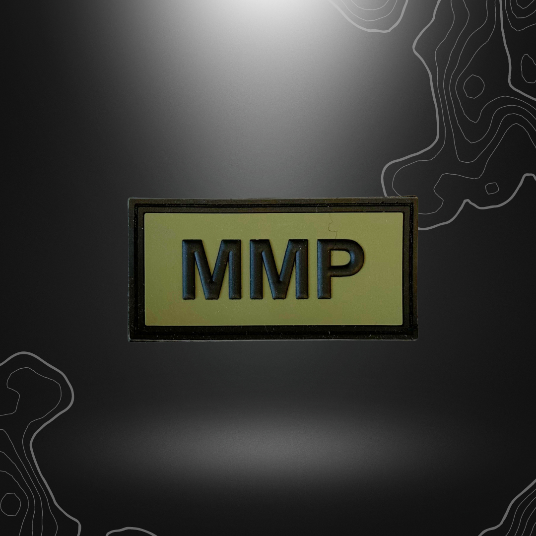 Patch spécialiste MMP sur fond vert