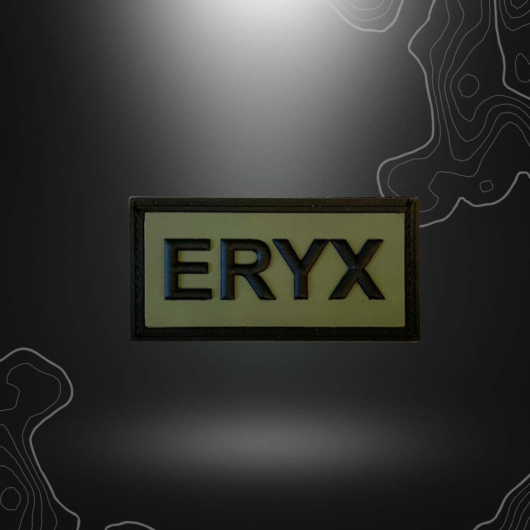 Patch brodé logo spécialiste Eryx sur fond vert