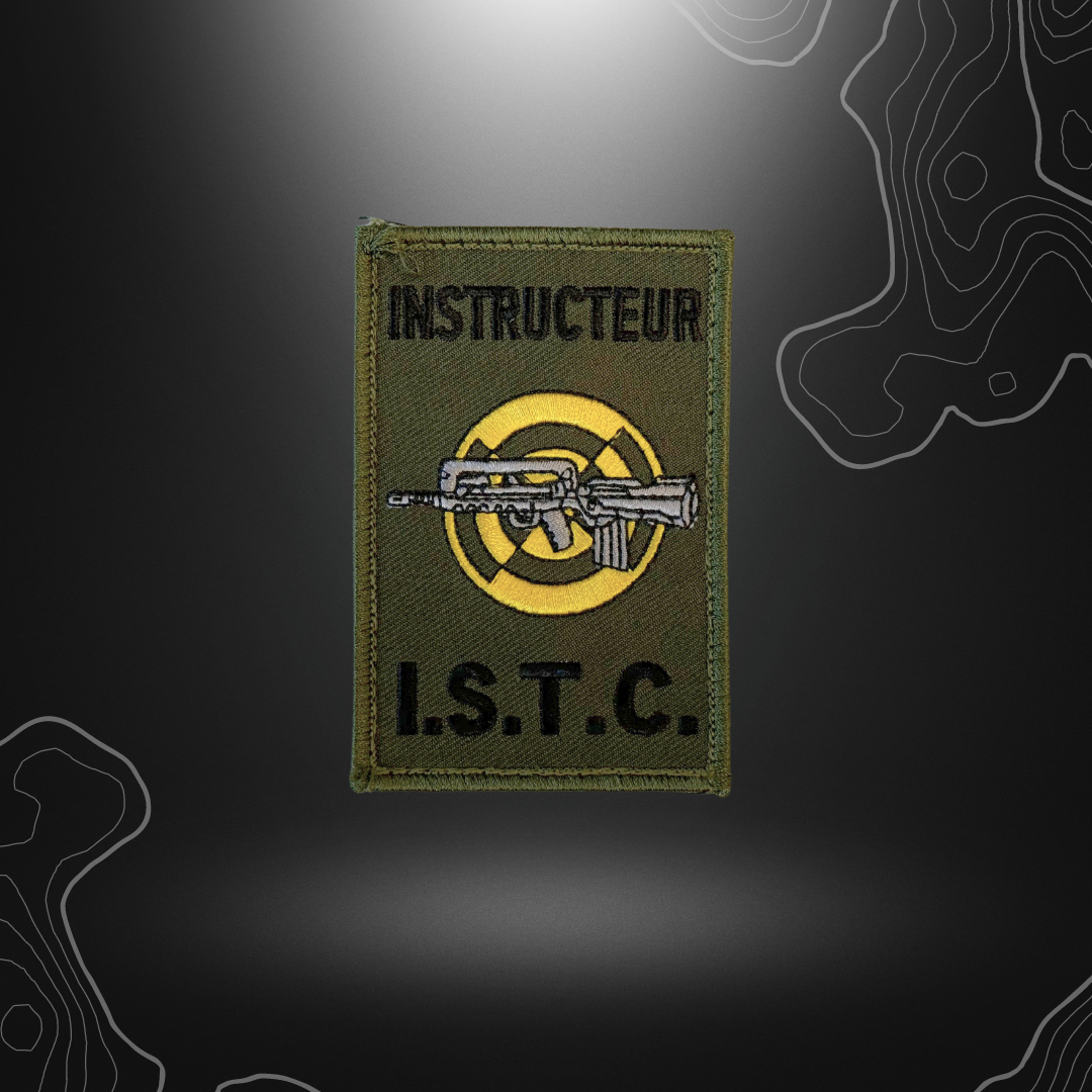 Patch d'instructeur spécialiste FAMAS ISTC sur fond vert