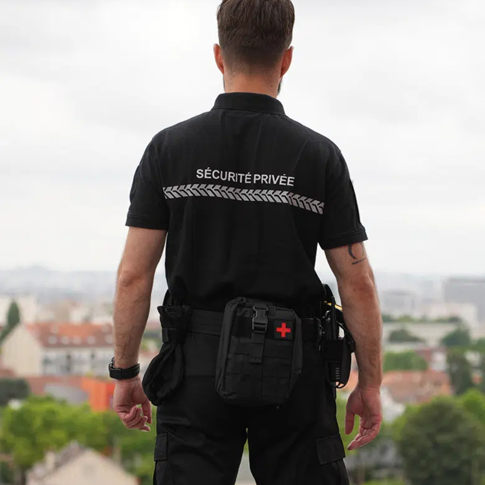 Manches courtes Polo Sécurité Privée GK SAFETEK en coton noir avec bande grise pour une visibilité accrue