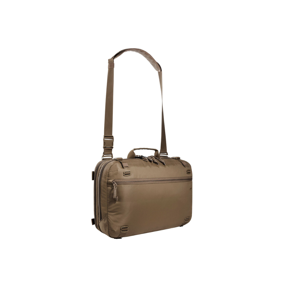 Alt tag de sac à bandoulière compressible Tasmanian Tiger avec deux compartiments verrouillables, bandoulière ajustable et zones MOLLE pour équipement individuel.