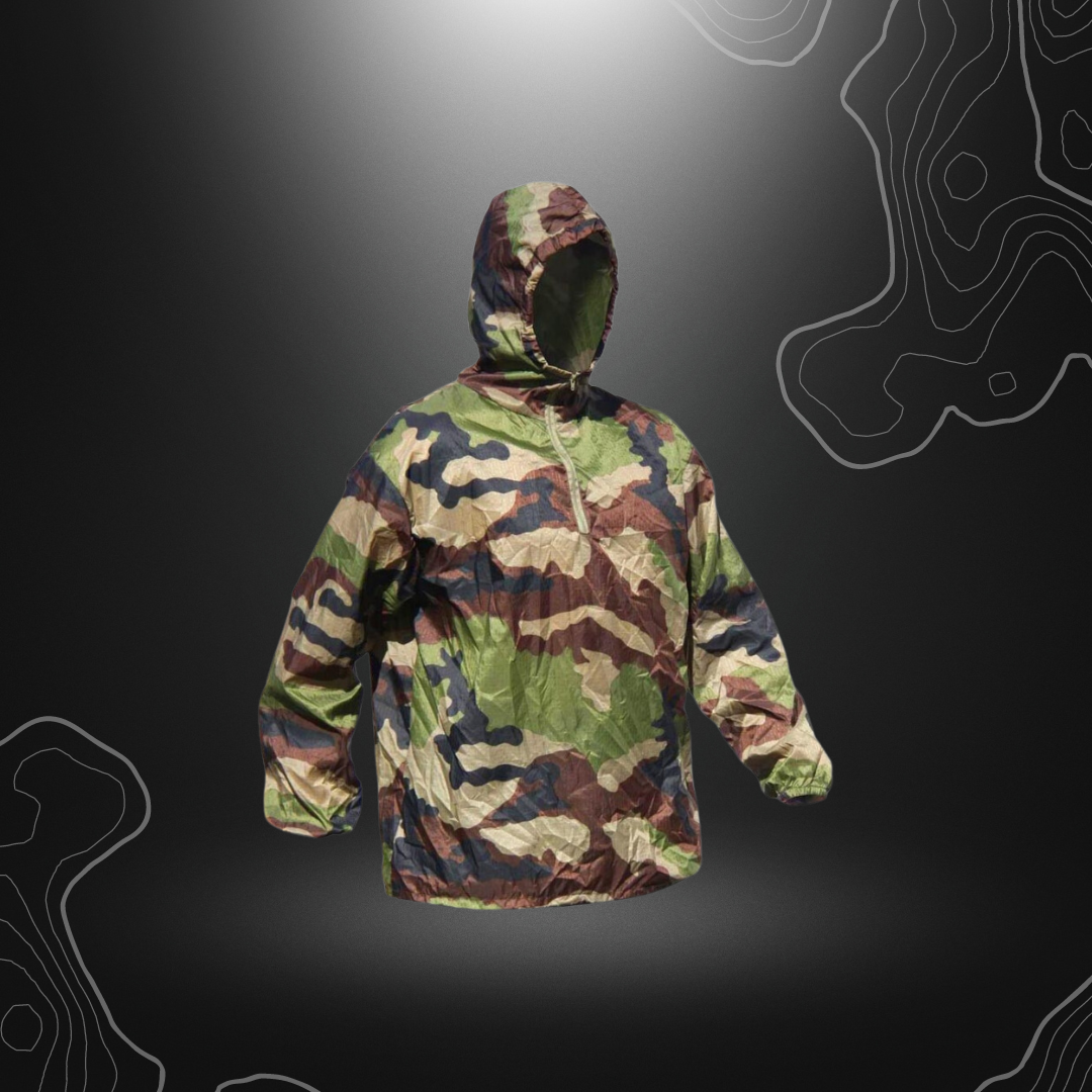 Veste coupe-vent Stowaway ultra-légère et compacte en nylon mini rip stop, résistante à la déchirure et déperlante grâce à un traitement DWR, avec capuche et poignets é