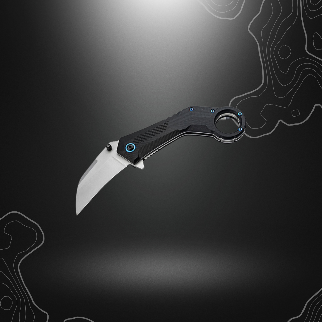 Karambit Veloc de Böker Magnum, couteau polyvalent avec lame Wharncliffe en acier 440B, mécanisme d'ouverture assistée à ressort, système de verrouillage sûr et
