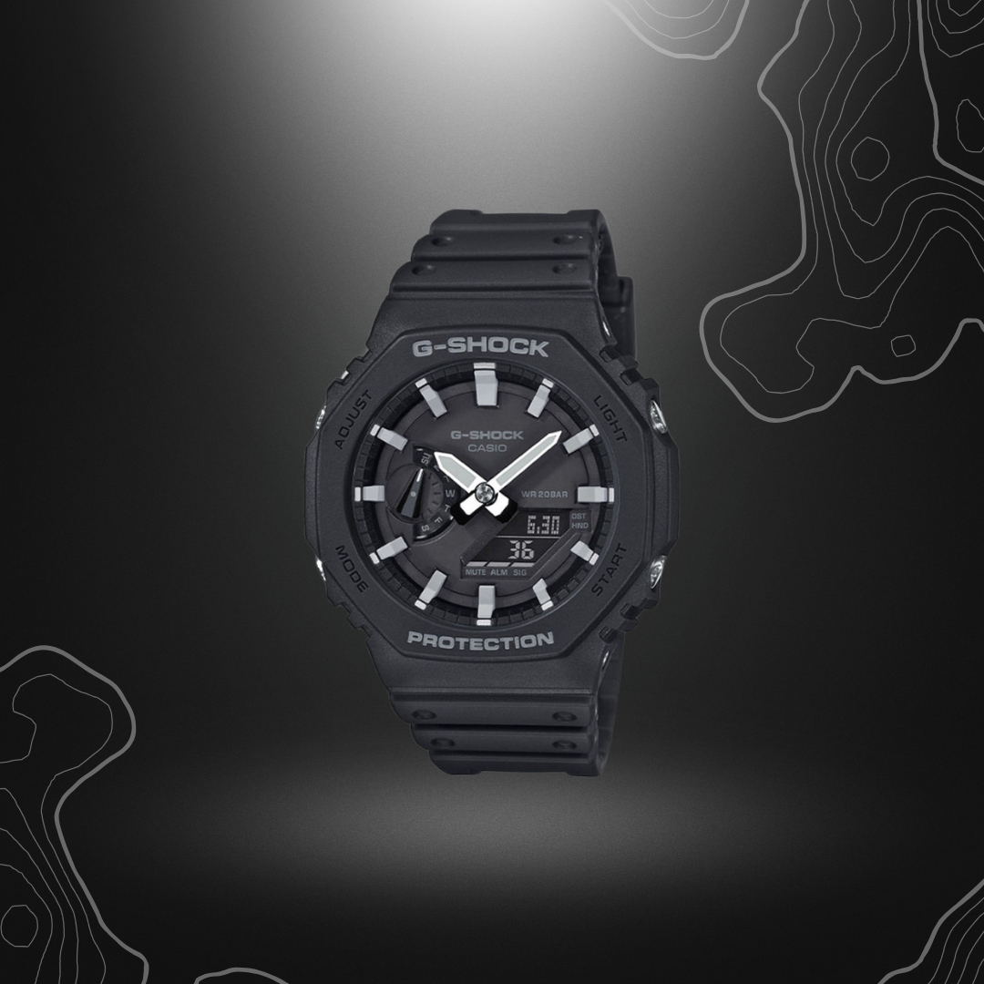 Montre G-Shock GA-2100 noir/gris de Casio avec cadran en verre minéral, boîtier et bracelet en résine, fonctionnalités numériques et analogiques, éclairage électrol