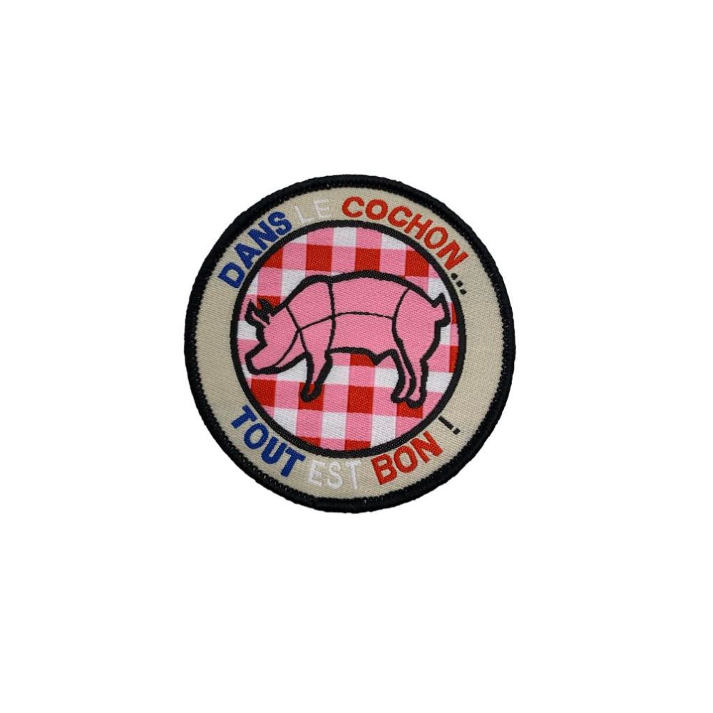 Patch de tissu avec le dicton français 'Dans le cochon tout est bon'