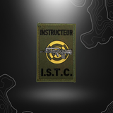 Patch d'instructeur spécialiste FAMAS ISTC sur fond vert