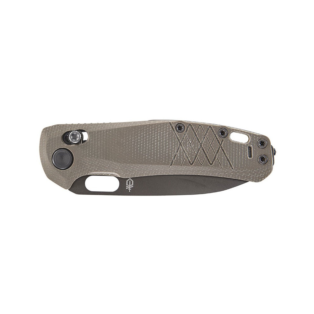 Couteau pliant Gerber Scout Coyote avec lame en acier et manche en micarta marron, idéal pour les aventures en plein air.
