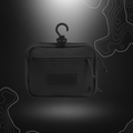 Robuste trousse de toilette noire Transall de A10 Equipment, conçue pour une utilisation fonctionnelle et durable