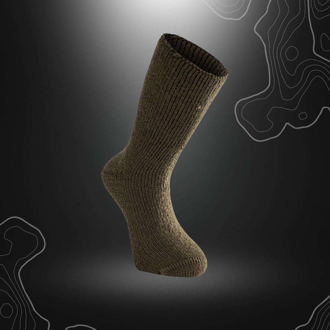 Chaussettes mérinos vertes 600 de Woolpower, avec tricot éponge et composition de 60% laine mérinos, 39% polyamide, et 1% élasthanne