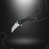 Karambit Veloc de Böker Magnum, couteau polyvalent avec lame Wharncliffe en acier 440B, mécanisme d'ouverture assistée à ressort, système de verrouillage sûr et