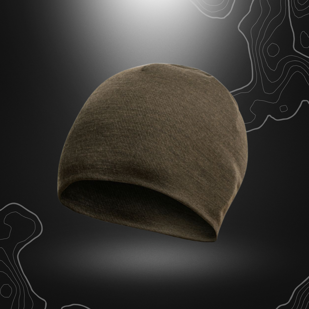 Bonnet Beanie Lite Merinos vert olive de Woolpower, fabriqué avec un tissu double épaisseur pour une isolation optimale, parfait comme couche de base pour temps chaud
