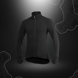 Veste noire Full Zip Jacket 600 Ullfrotté de Woolpower, idéale pour les conditions froides, avec col haut et poignets à trous pour les pouces