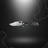 Alt tag pour un couteau flipper Honey Badger de taille moyenne en noir avec lame de 81mm, manche FRN et clip réversible