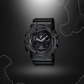 Montre G-Shock GA-100 noire de Casio avec cadran en verre minéral, bracelet en résine, affichages LCD, fonctionnalités multiples et résistance à l'eau
