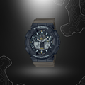 Montre G-Shock GA-100TU noir/vert olive de Casio avec cadran en verre minéral, bracelet en résine, affichages LCD, résistance magnétique et multiples fonctions.