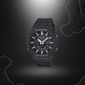 Montre G-Shock GA-2100 noir/gris de Casio avec cadran en verre minéral, boîtier et bracelet en résine, fonctionnalités numériques et analogiques, éclairage électrol