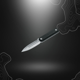 Poignard Böker Plus Omerta 02BO032 avec lame spear point en acier D2 et manche en G10 noir