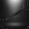 Kihon DC All Black 01BO905 Boker Plus pliant avec lame en acier D2, manche en nylon noir et système d'ouverture Crossbar Lock.