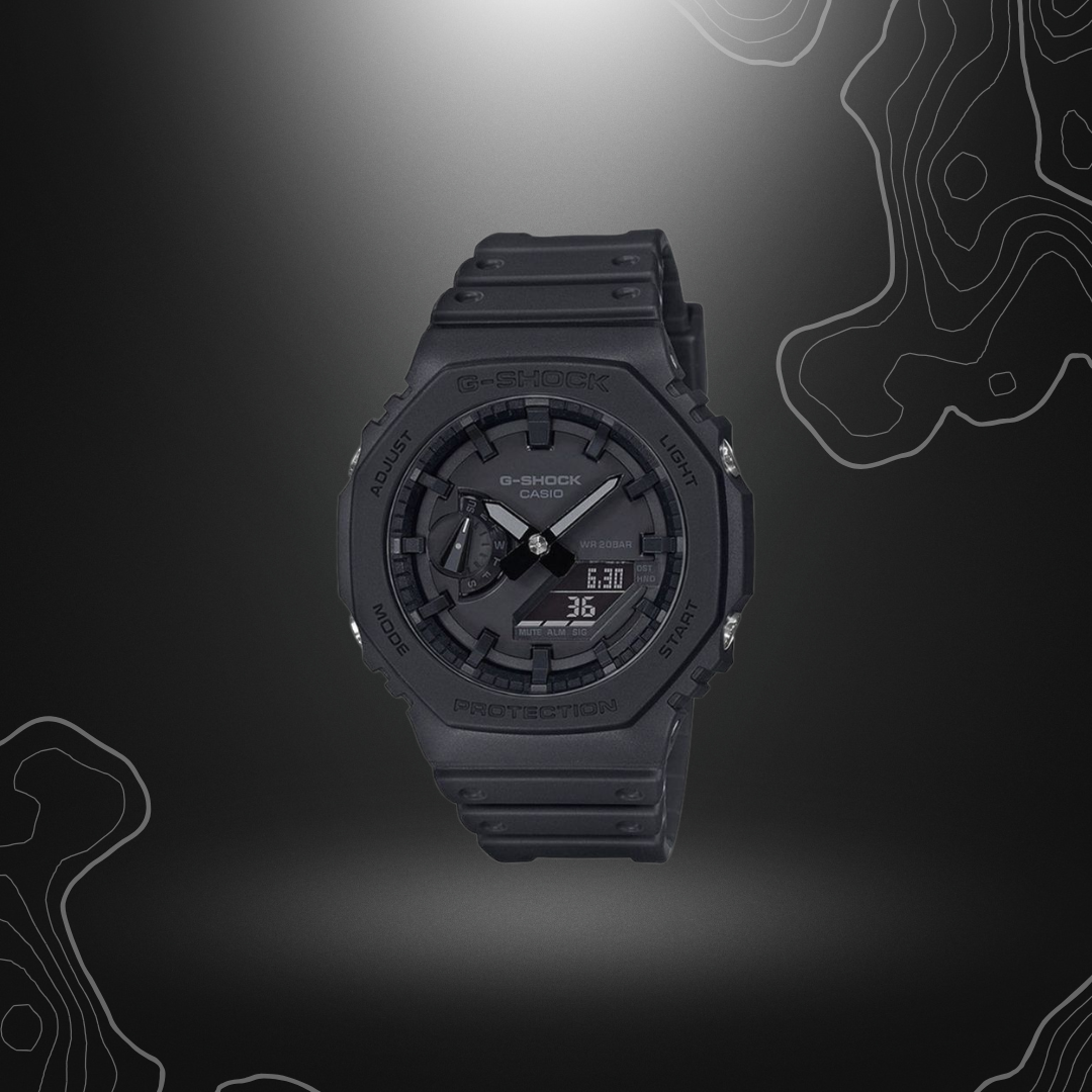 Montre G-Shock GA-2100 noire Casio avec cadran en verre minéral et bracelet en résine, dotée de fonctionnalités comme calendrier automatique, heure universelle, chronomètre et alarm