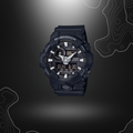 Montre G-Shock GA-700 noire de Casio avec cadran en verre minéral, bracelet en résine, affichage analogique et numérique, et multiples fonctionnalités.